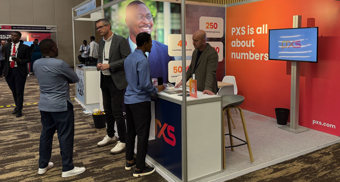 Jasper and Bart of PXS talk to customers at MWC Kigali 2025